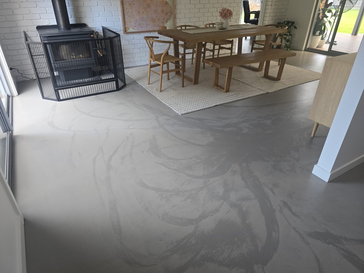 Decorative concrete overlay in a furnished living area